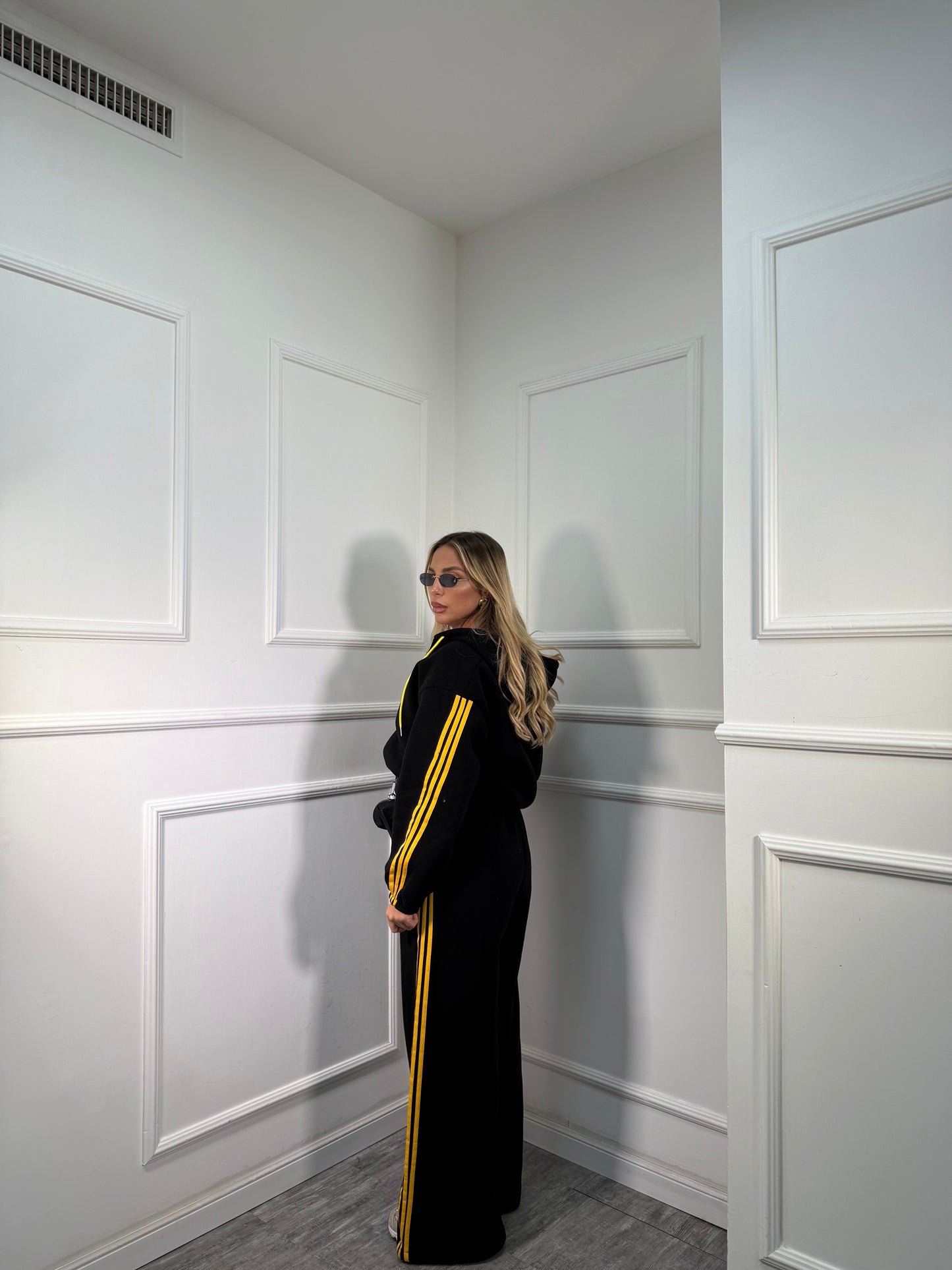 Coordinato in tuta Again nero/giallo 22648