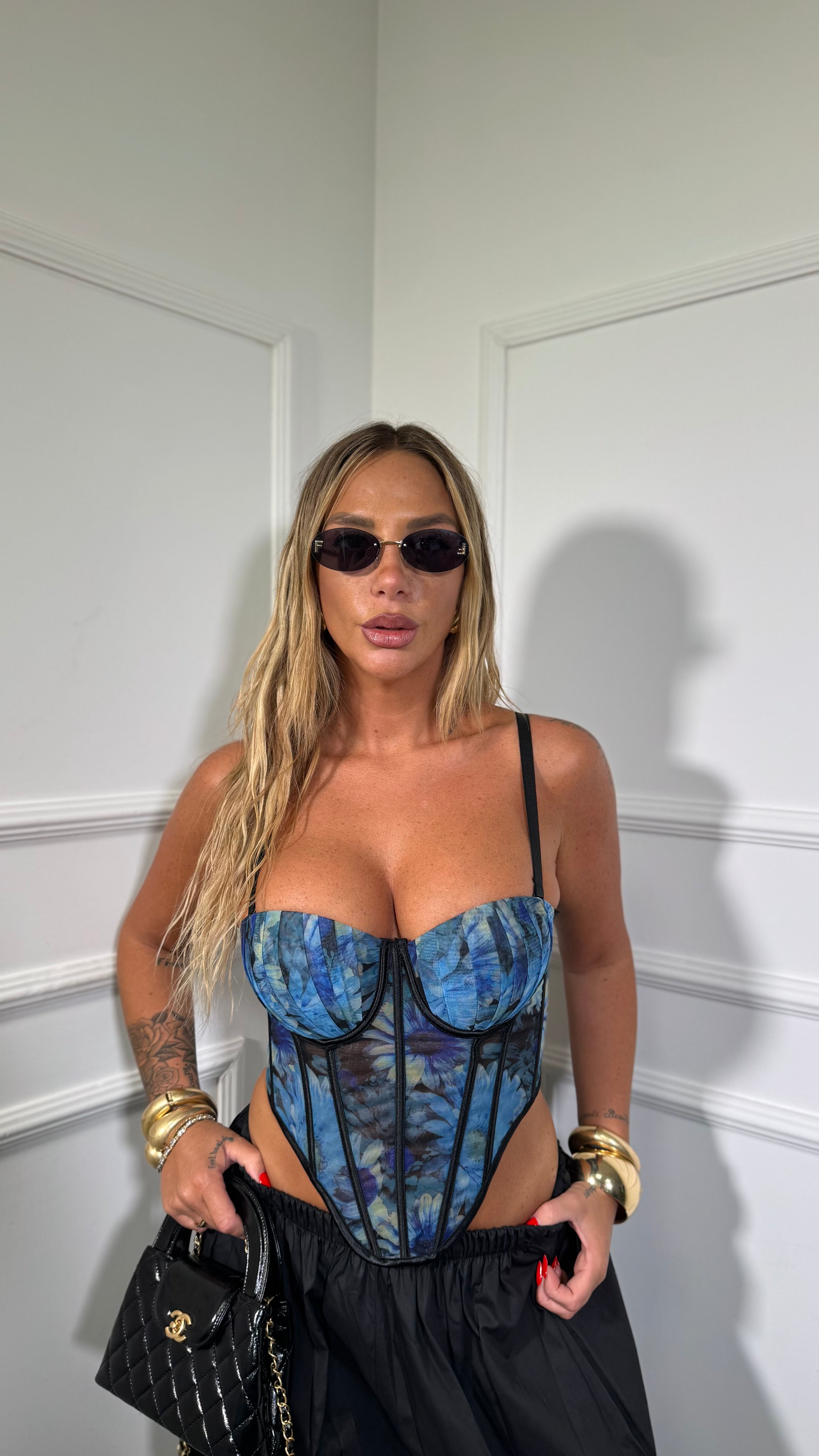 Bustier semi velato steccato floreale Leyda fondo blu