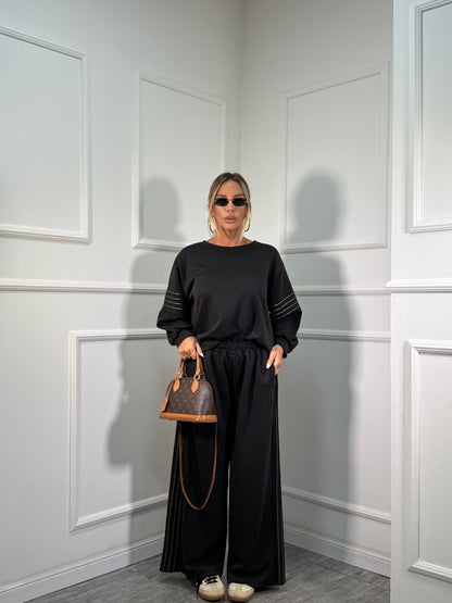 Coordinato in tuta Gold nero dalla 44/52 118911