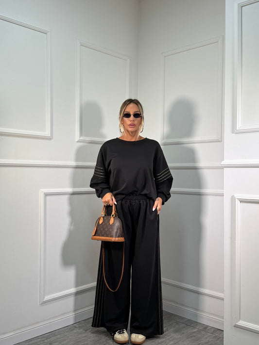 Coordinato in tuta Gold nero dalla 44/52 118911