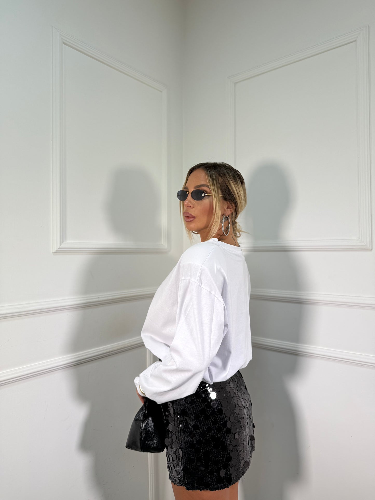 Gonna pantaloncino macro paillettes nera tr25043