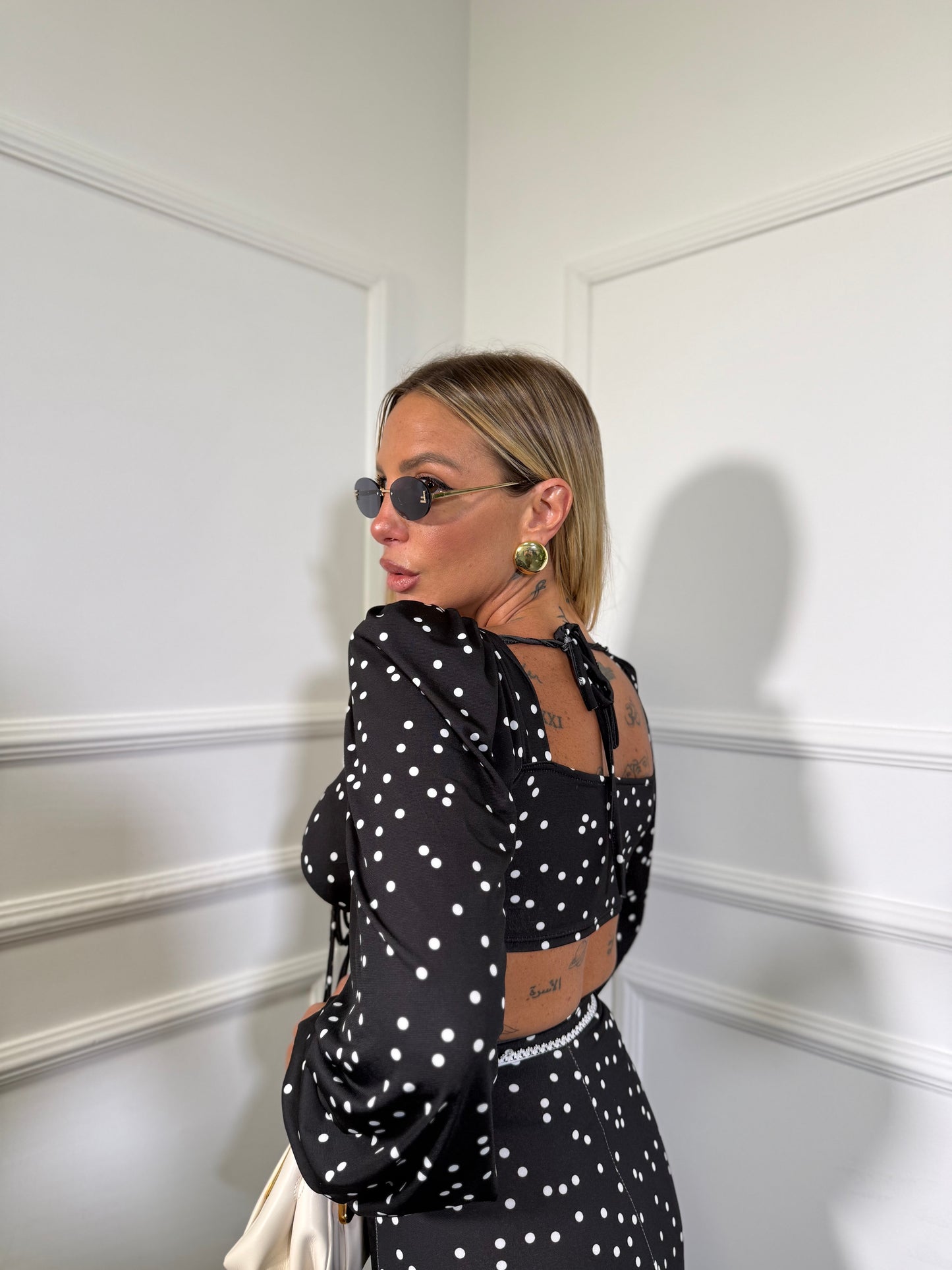 Coordinato in lycra pois Coya nero 12150
