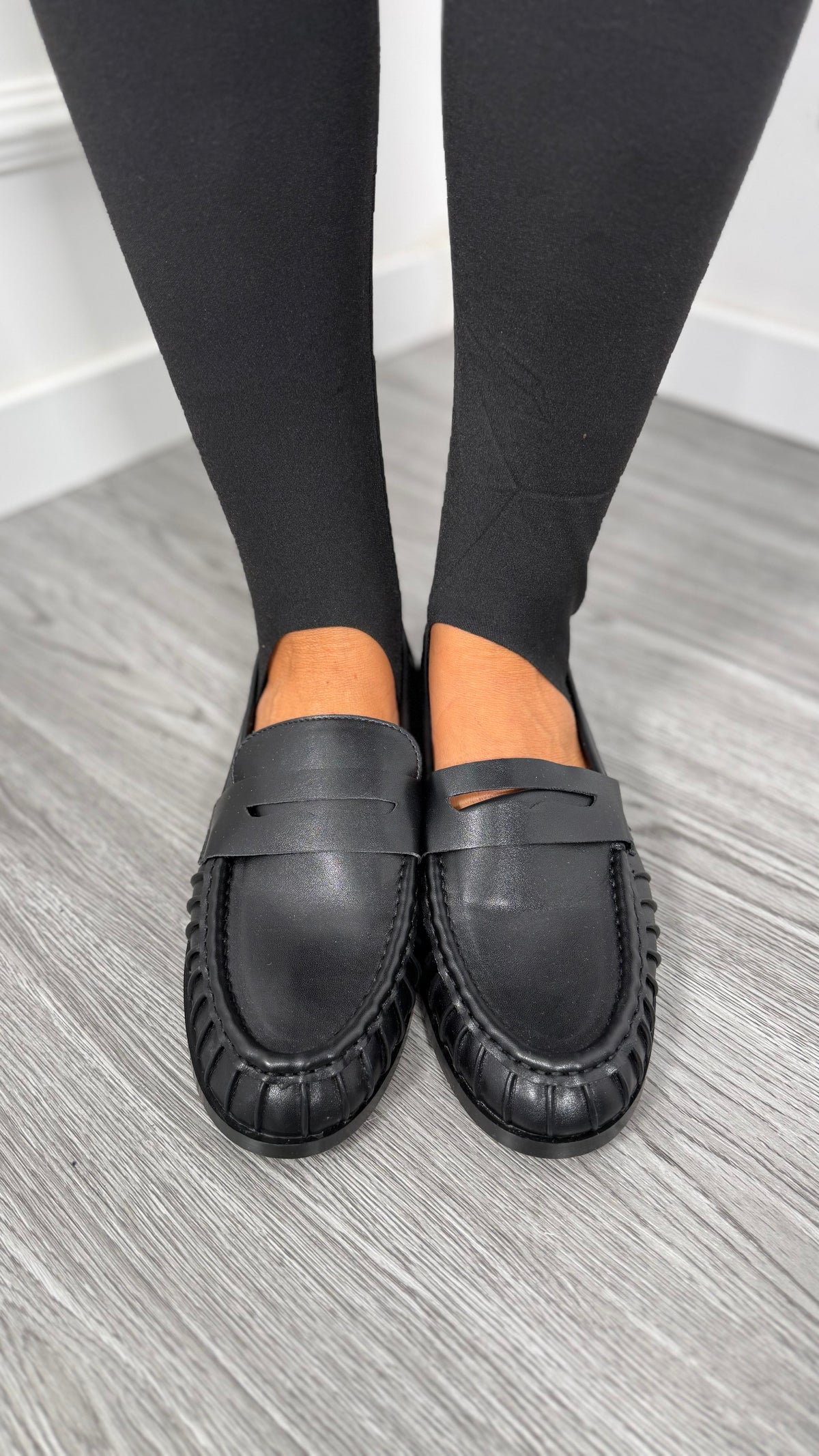 Mocassino ecopelle con drappeggio nero D1662