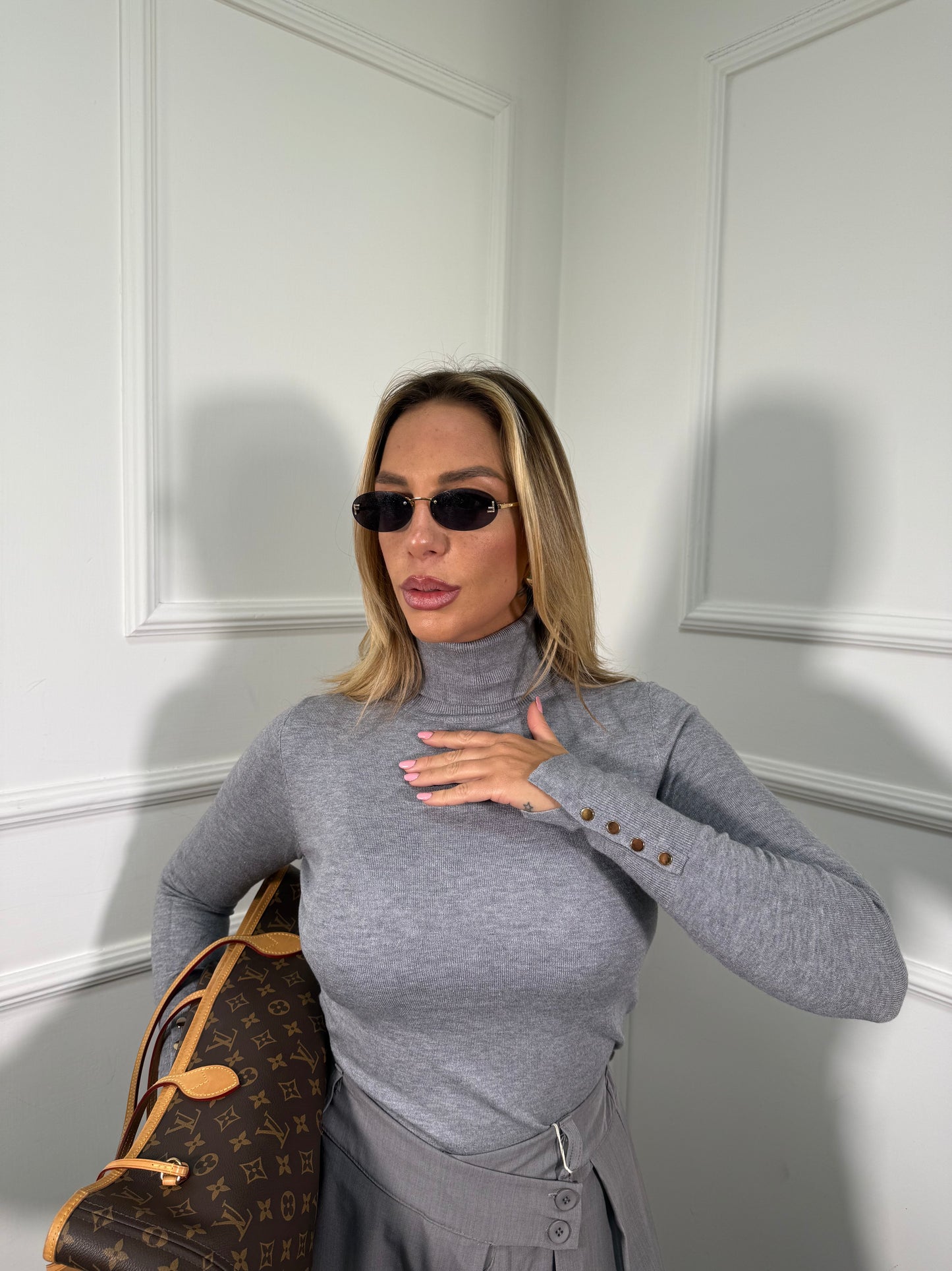 Dolcevita con bottoncini oro grigio al006