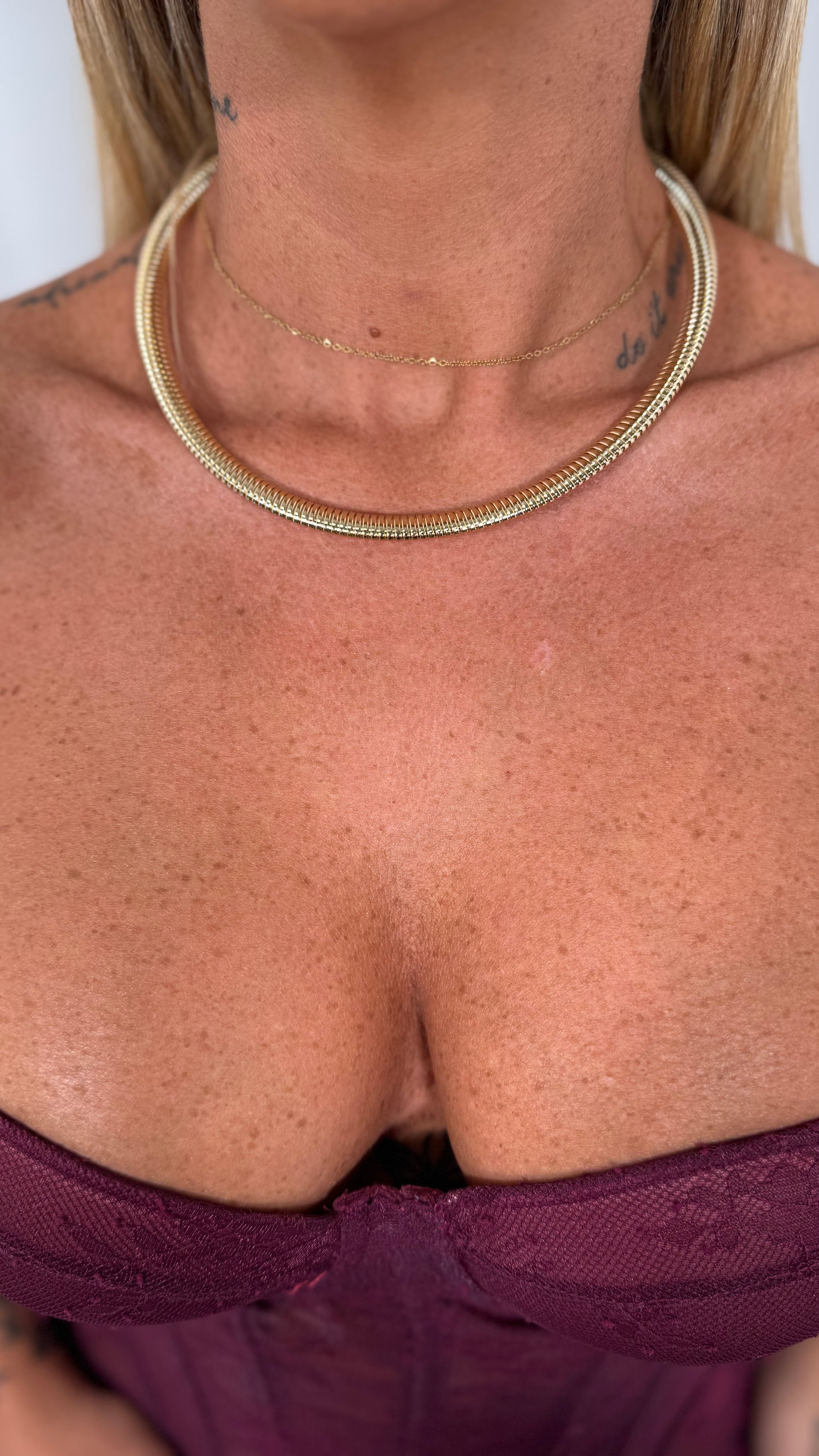 Collana girocollo rigida oro