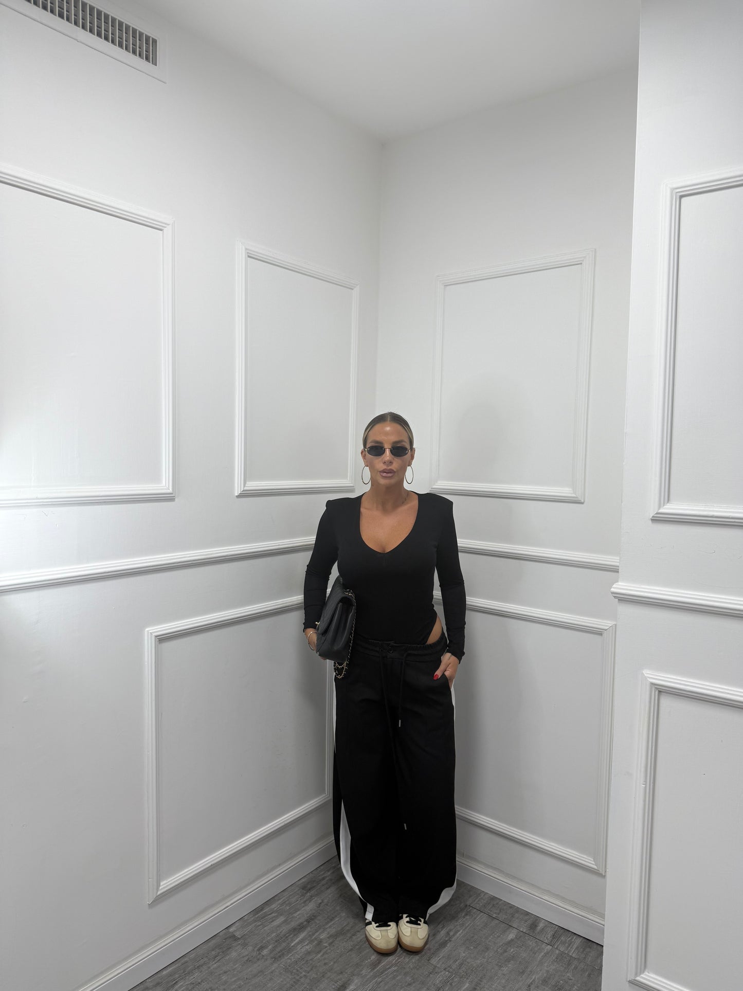 Pantaloni palazzo con banda laterale Running nero 66618