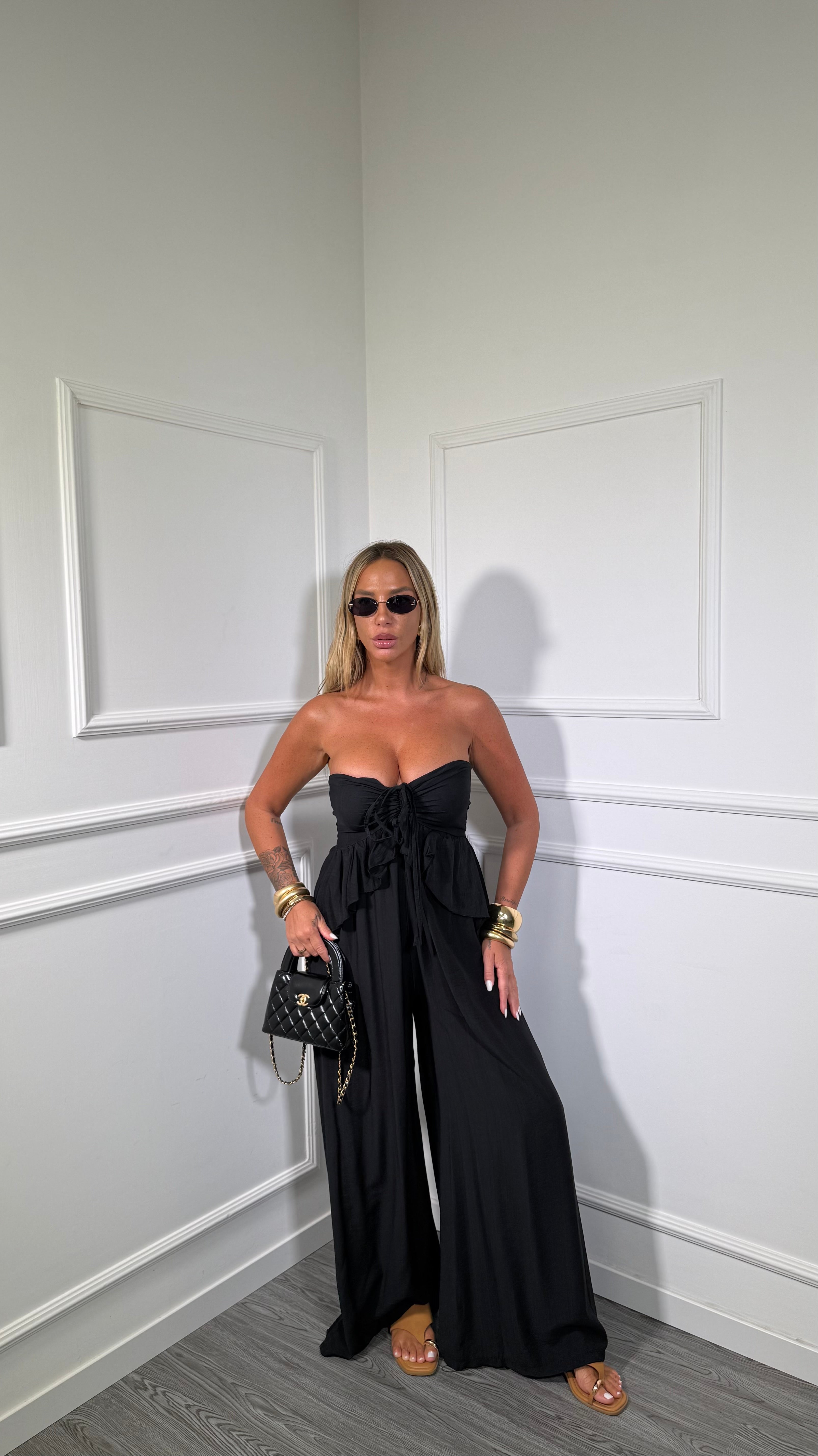 Jumpsuit palazzo in viscosa con rouges nera 51700