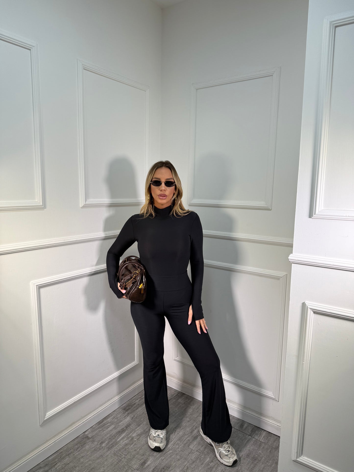 Coordinato in lycra con body collo alto nero 16160