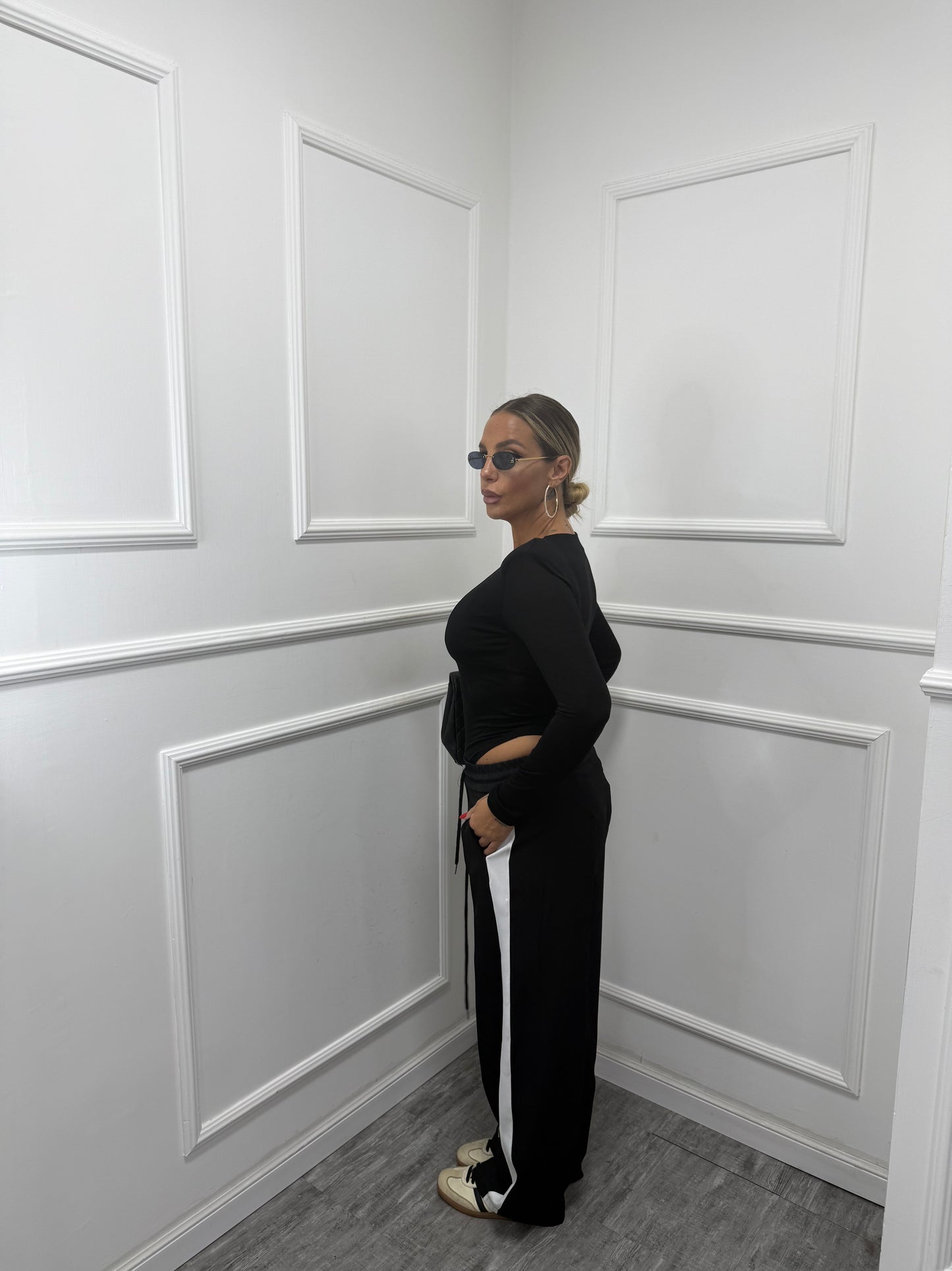 Pantaloni palazzo con banda laterale Running nero 66618