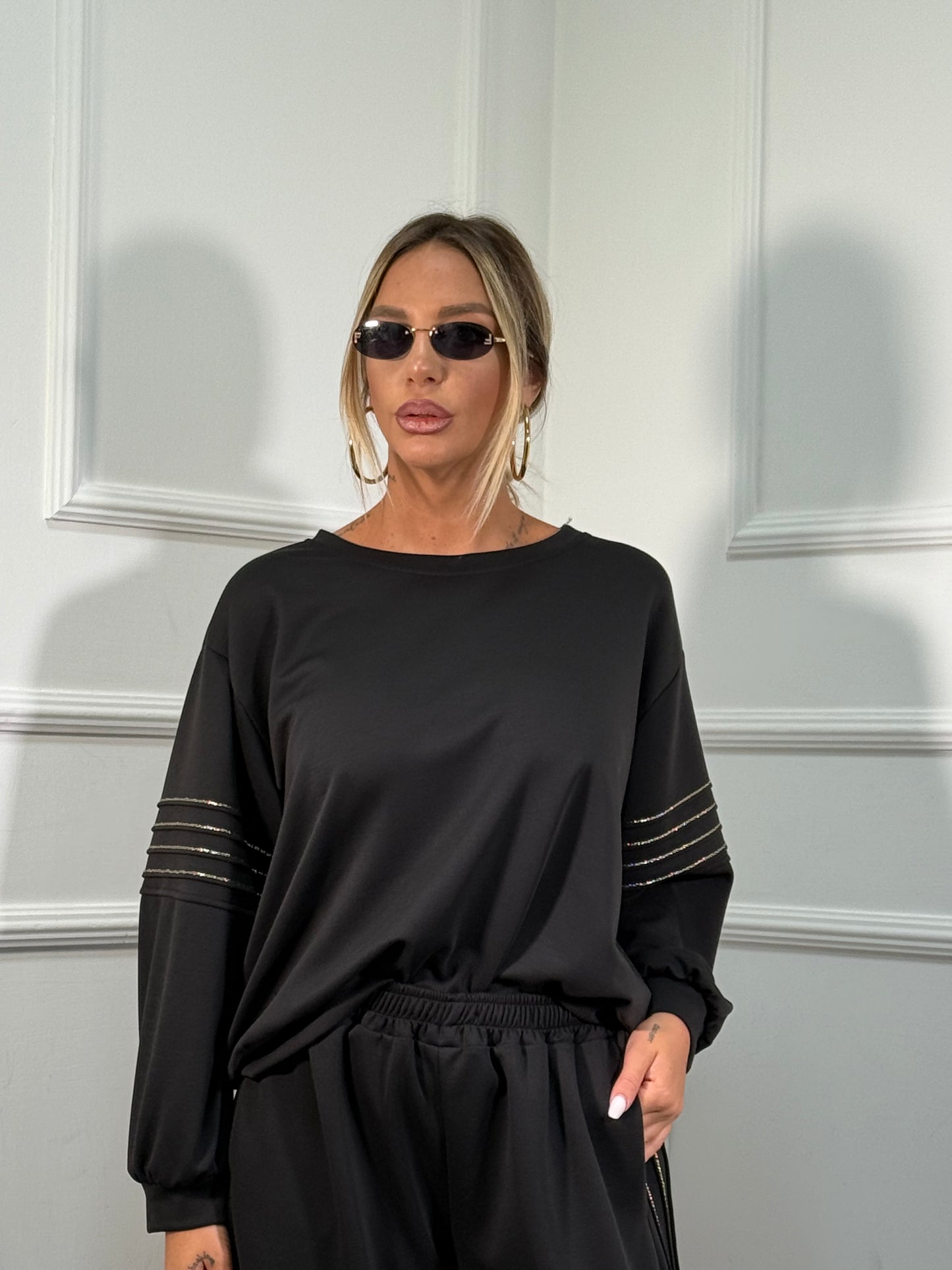 Coordinato in tuta Gold nero dalla 44/52 118911