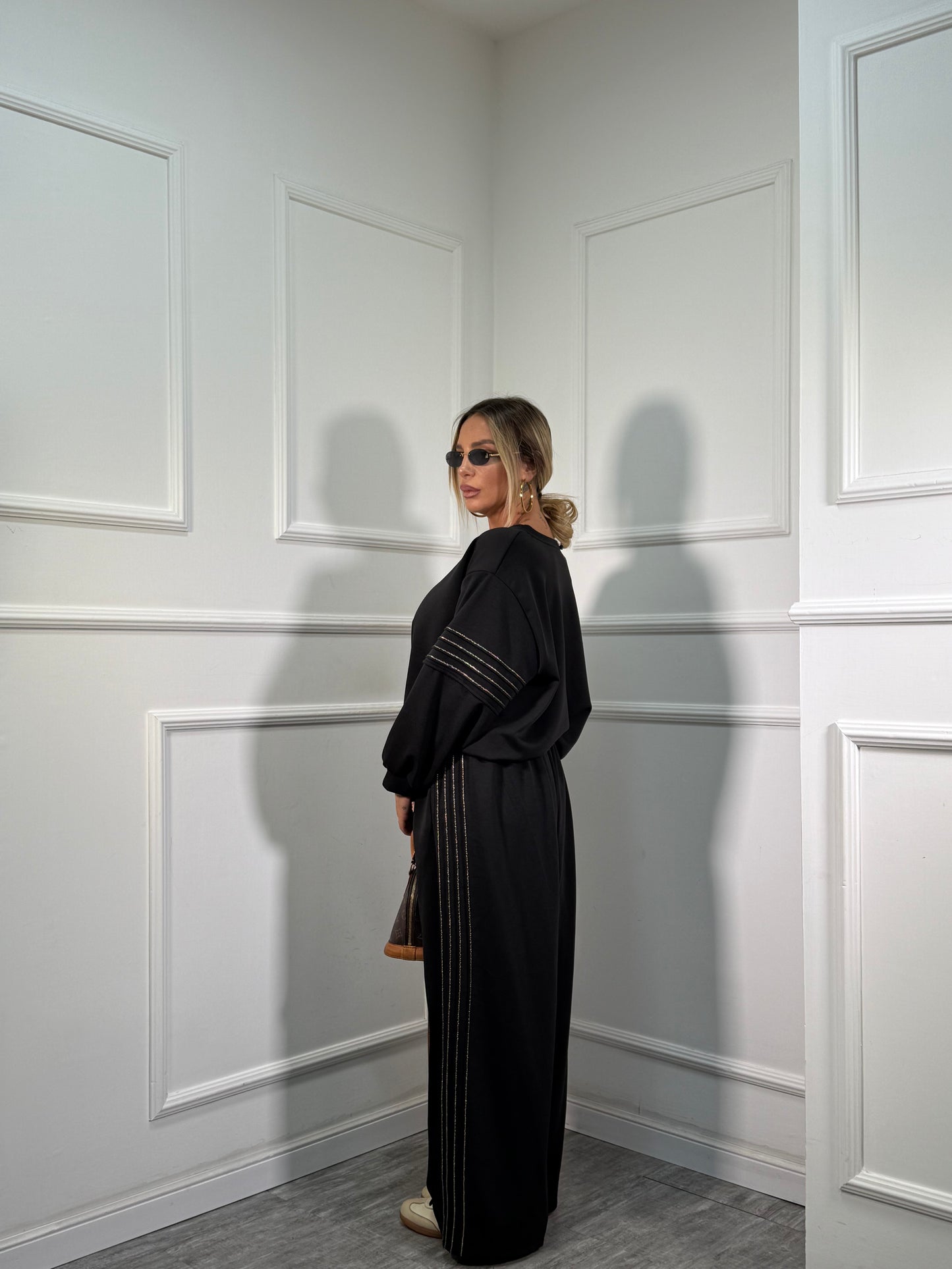 Coordinato in tuta Gold nero dalla 44/52 118911