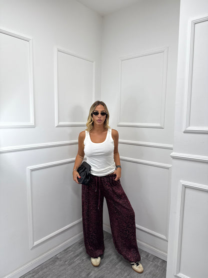 Pantaloni balloon in satin maculati bordeaux 24512