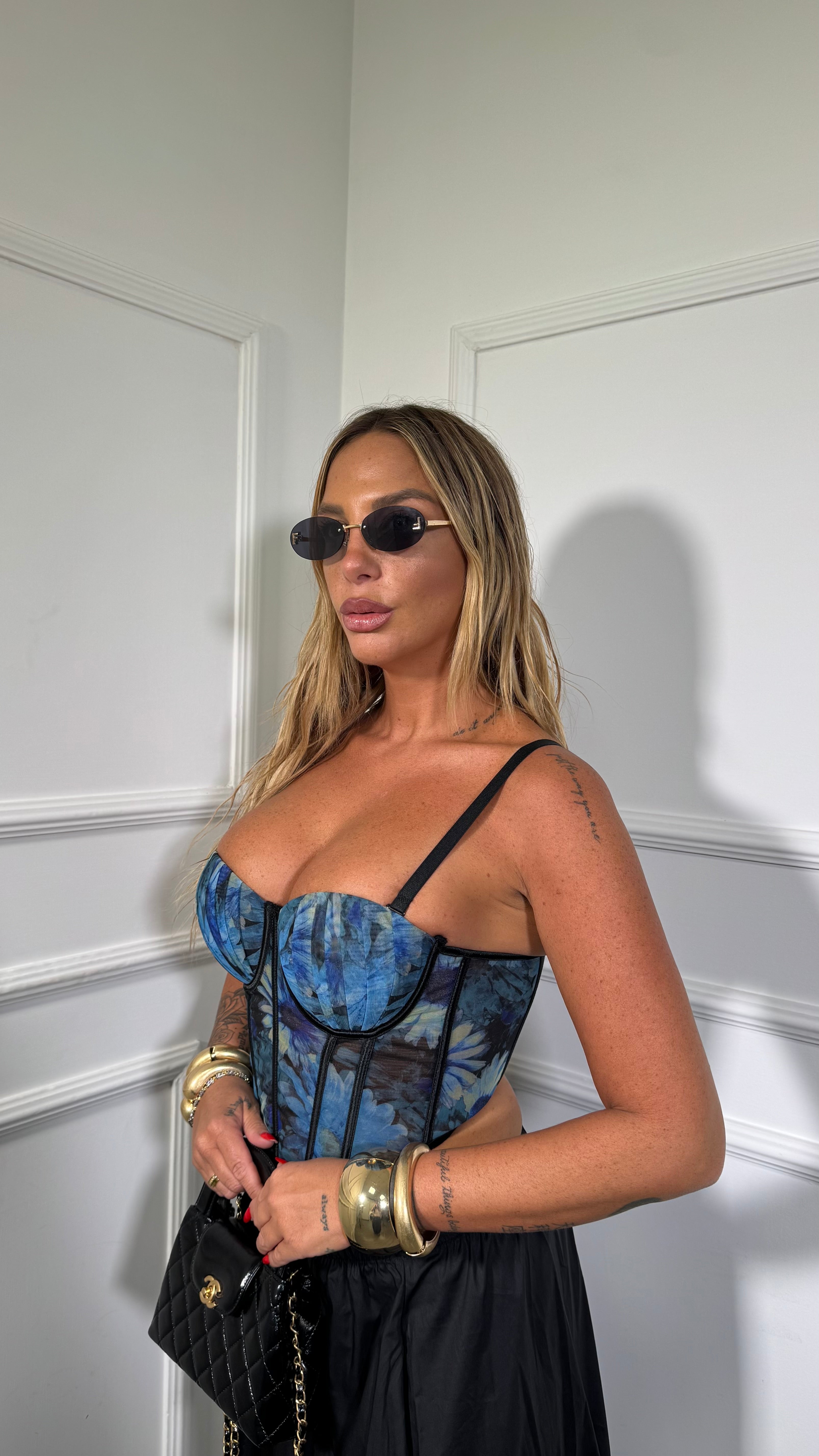 Bustier semi velato steccato floreale Leyda fondo blu