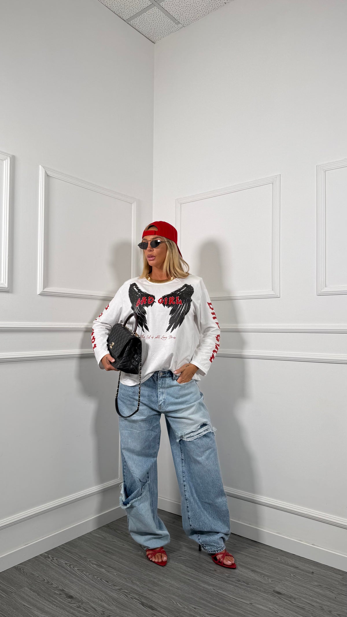 Jeans palazzo lavaggio chiaro con strappi t6102-1